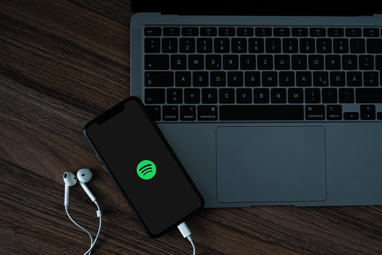 mobile phone, spotify, laptop, headphones, smartphone, cellphone, music service, music, social media, entertainment, podcast, macbook, technology, spotify, spotify, spotify, spotify, spotify